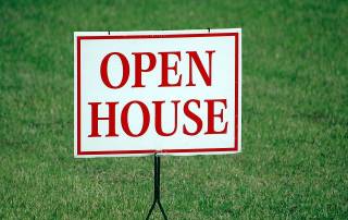 open house sign in yard